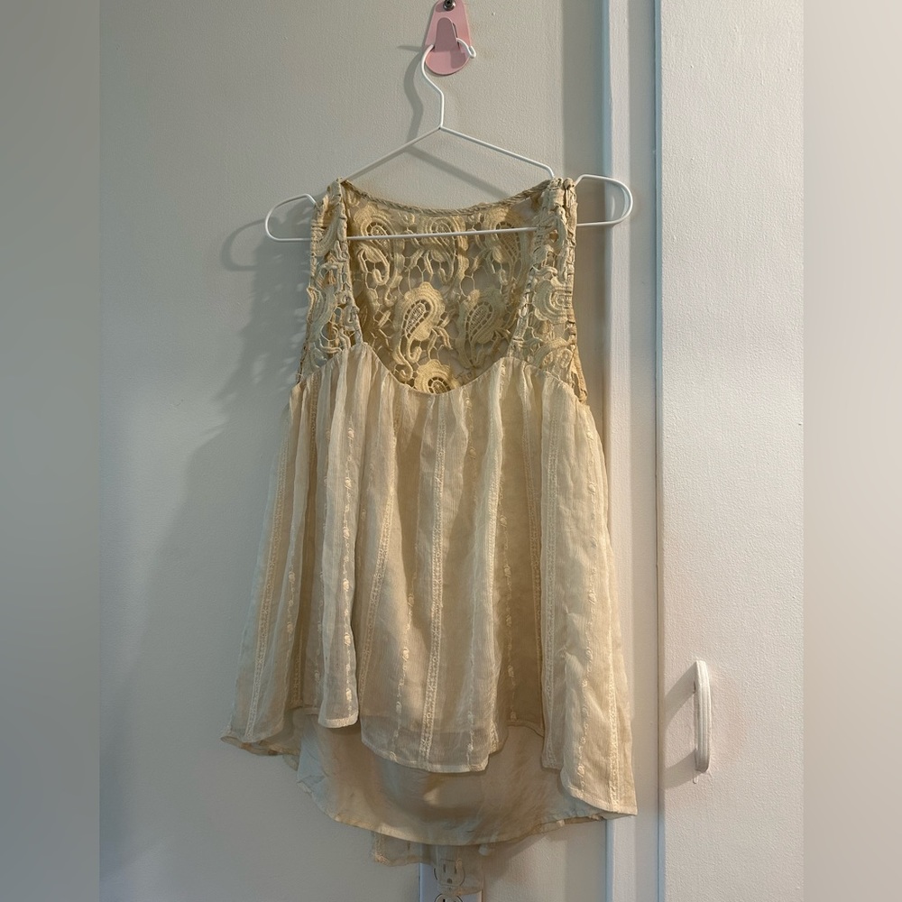 Vintage boho camisole with crochet top and flowy bottom. No size tag.